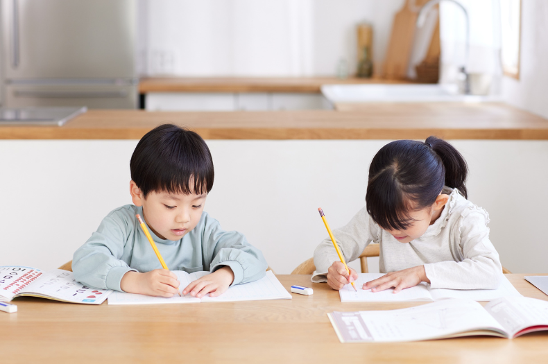 Young student learning at desk